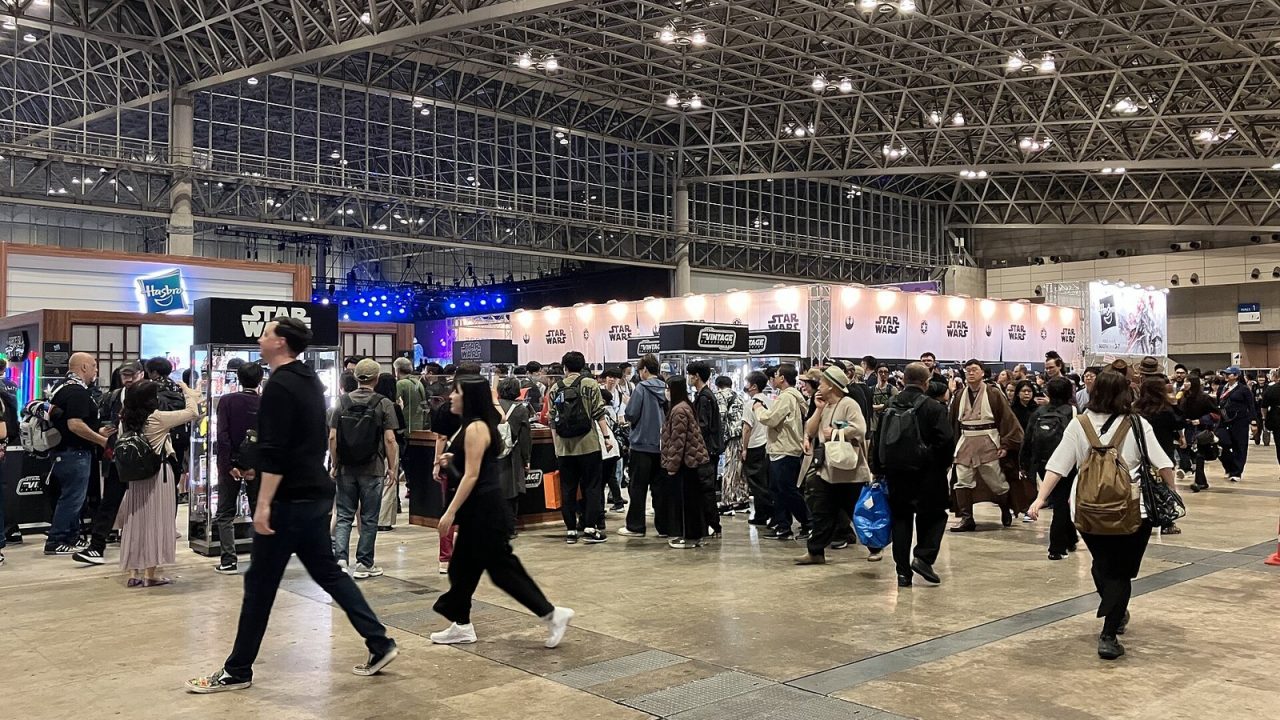 Fans walking across the busy exhibition floor at Star Wars Celebration Japan 2025